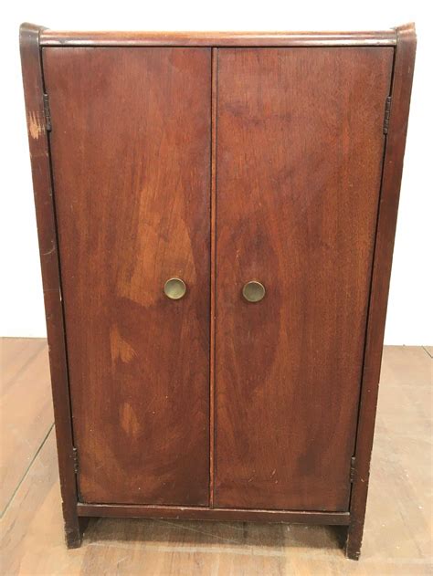 Maybe you would like to learn more about one of these? Lot - Vintage Phonograph Stand & Record Storage Cabinet