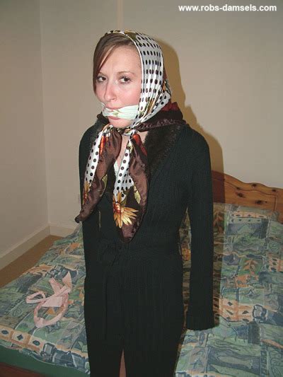 sophia smith wearing a headscarf and gagged with s tumbex