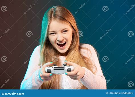 Screaming Happy Woman Playing Video Game With Joystick Stock Image