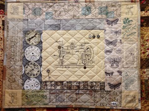 Tim Holtz Fabric With An Urban Threads Embroidery Design In The Center