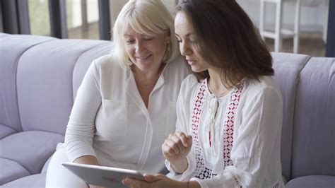 Mother Daughter Bonding Over Photos On Stock Footage Sbv 337747160