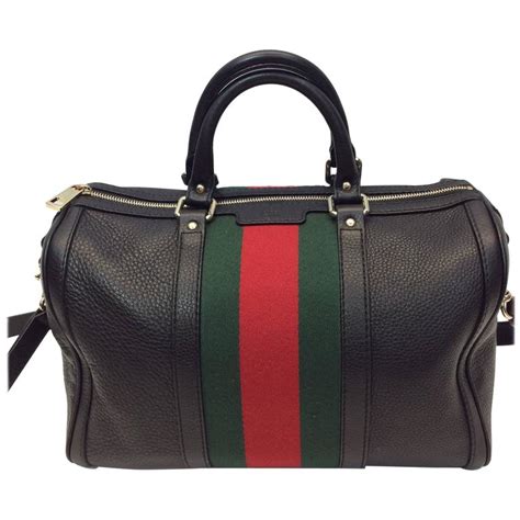 Gucci Black Striped Barrel Bag For Sale at 1stdibs