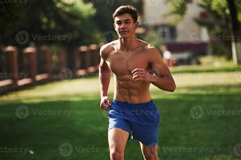 Going Forward Muscular Shirtless Man Have Fitness Day And Running In