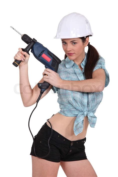 Sexy Woman Using A Power Drill Stock Photo Colourbox