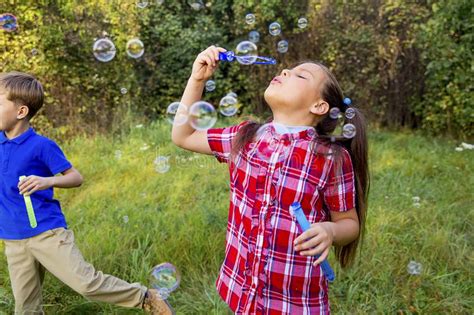 Kids Playing With Bubbles Stock Photo Image Of Spring 105188258