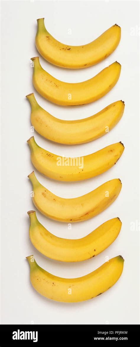 Seven Bananas In A Row Stock Photo Alamy