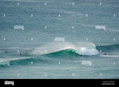 Surfing At Dreamland Beach In Bali Indonesia Stock Photo Alamy