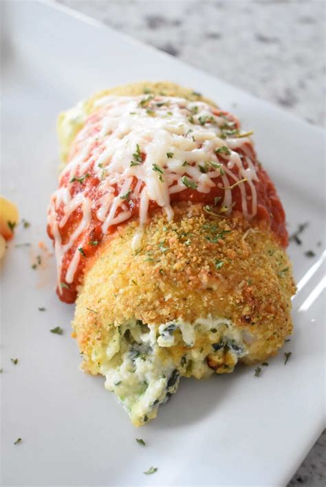 Chicken rollatini with spinach alla parmigiana is italian comfort food at it's finest! Chicken Rollatini with Spinach and Parmesan - Lou Lou Girls
