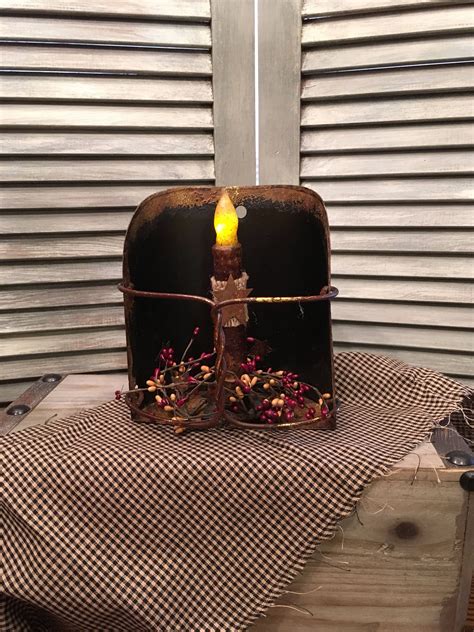 11.5 inches from bottom to the top of the wood. Black Primitive Candle Sconce with a Candle and Berry Ring ...