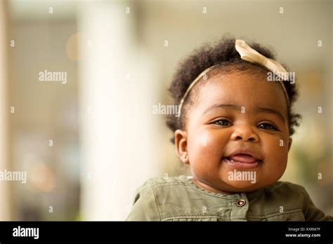 African American Baby Girl Laughing And Smiling Stock Photo Alamy