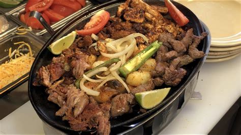 Parrillada Is A Mouth Watering Mountain Of Meat Filled With Carne