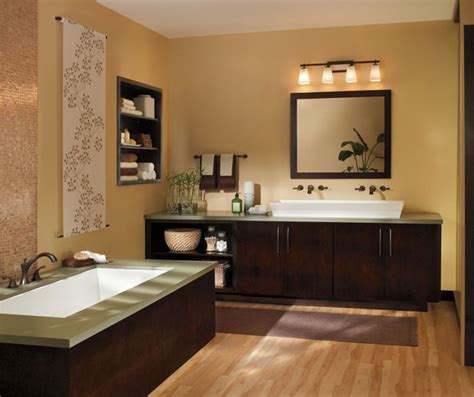 Modern bathroom + green cabinets + painted bathroom vanity + bold bath vanity + contemporary drawer pulls + black frame glass shower door + ceiling the dark espresso finish adds depth and richness while maintaining a warm, calming aesthetic. Cabinet Colors - Colored Kitchen Cabinets - Diamond