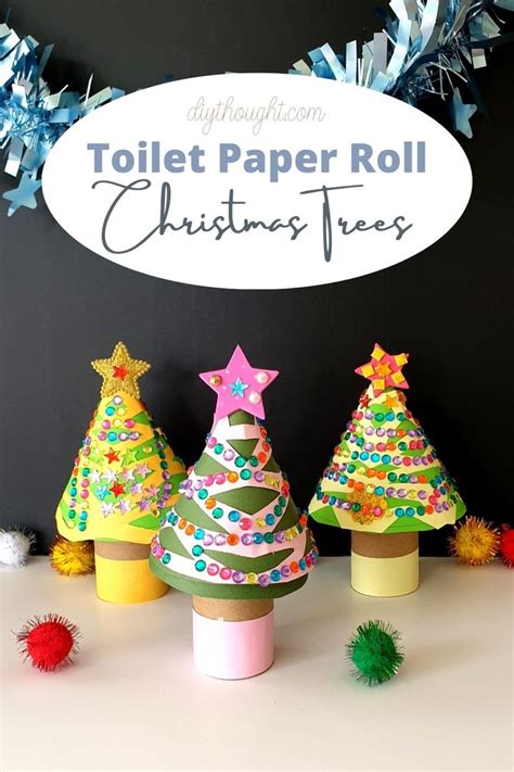Toilet Paper Roll Christmas Trees With Pom Poms Around Them And A Sign