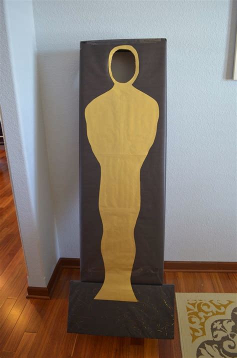 Hollywood party decoration includes foil swirl cutouts of cameras,boards & swirl. Make an Oscar for your guest to pose in! Academy Awards ...
