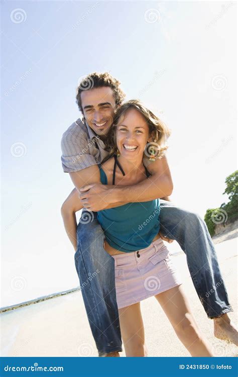 Man Carrying Woman