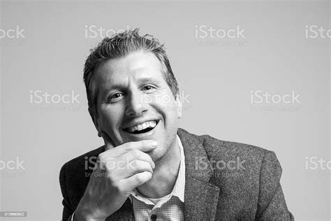 Attractive Businessman Portrait Looking Happy At Camera Stock Photo