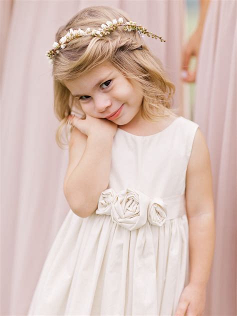 When it comes to girls hairstyles, the most important things to keep in mind are practicality, appropriateness, and of course, cuteness! Adorable Hairstyle Ideas for Your Flower Girls | Martha Stewart Weddings
