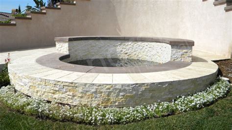 Stone Cladding With Curves Using Stone Veneers And Stacked Stone On