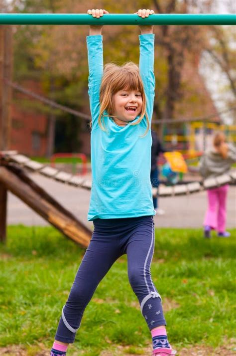 Cute Little Girl Playing On The Playground Stock Photography Image