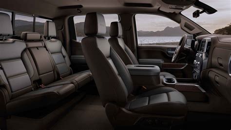 Side View Of 2021 Gmc Sierra 1500 Interior Parked By A Body Of Water