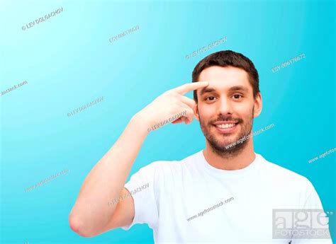 Health And Beauty Concept Smiling Young Handsome Man Pointing To