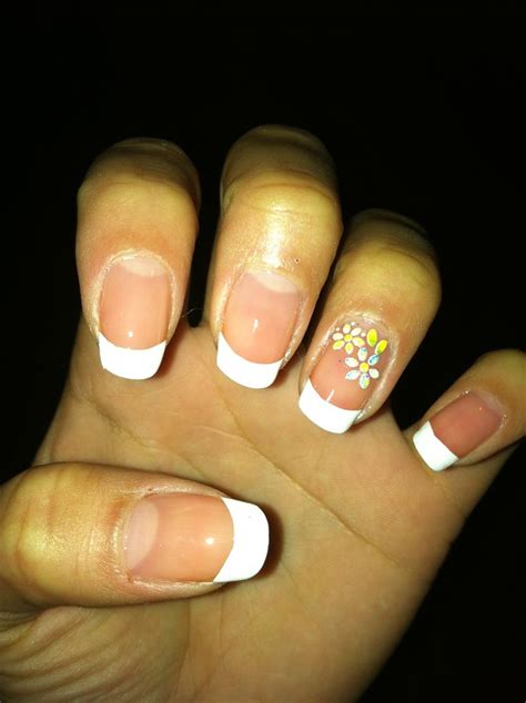 French Tip With Flowers On The Ring Finger Cute Nail Designs
