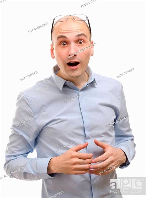 Young Man With A Shocked Facial Expression Stock Photo Picture And