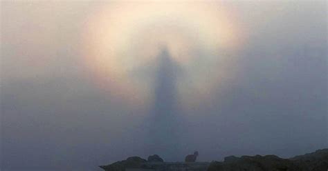 figure in the clouds caught in 2020 sunrise photo
