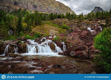 Red Rock Falls At Many Glacier Glacier National Park Stock Photo
