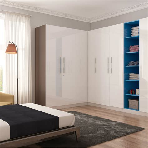 Simple modular wardrobe made stylish with blue shelves | Modular