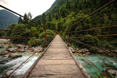 Wooden Bridge Over The Mountain River Stock Photo Image Of Emerald