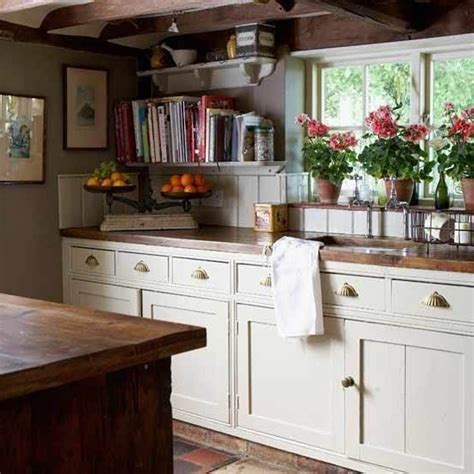 A country kitchen adds a timeless touch of warmth to the home with rustic decorations that remind us of a simpler time. Designarthouse.com | English country kitchens, Cottage style kitchen, Cottage kitchens