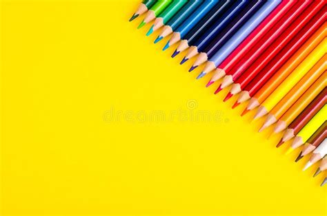 Set Of Colored Pencils For Schoolboy On Bright Background Stock Image
