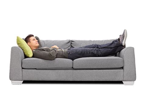 Pensive Young Guy Laying On A Sofa Stock Image Image Of Isolated