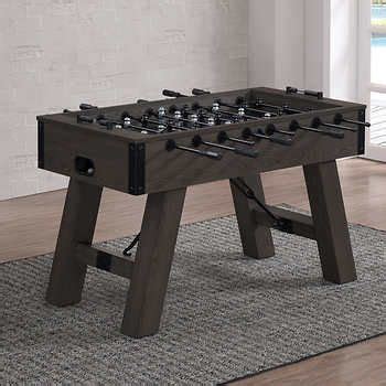 The tabletop is made from solid pine wood and has a butcher block style with visible wood grain and knots for a rustic, antique look. Foosball Game Coffee Table Costco - Coffee Table Design Ideas
