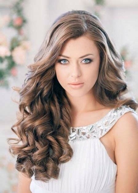 Make your long curly hair an icy platinum blonde. 12 Vouluminous Curly Hairstyles for Long Hair - Pretty Designs