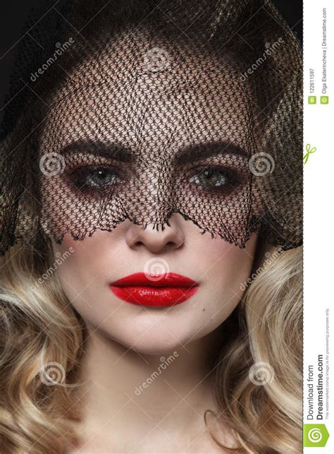 Portrait Of Young Beautiful Woman With Red Lipstick And