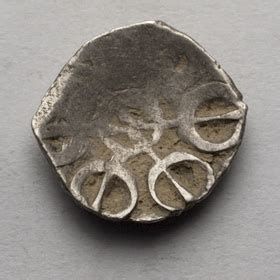 One more of these very early taxila shatamana bent bar coins, seen from all angles (length 11.3mm / 0.44 inches; janapadacoins