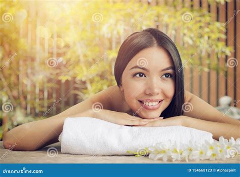 Woman Relaxing With A Massage In A Spa Center Stock Image Image Of Flower Comfortable 154668123