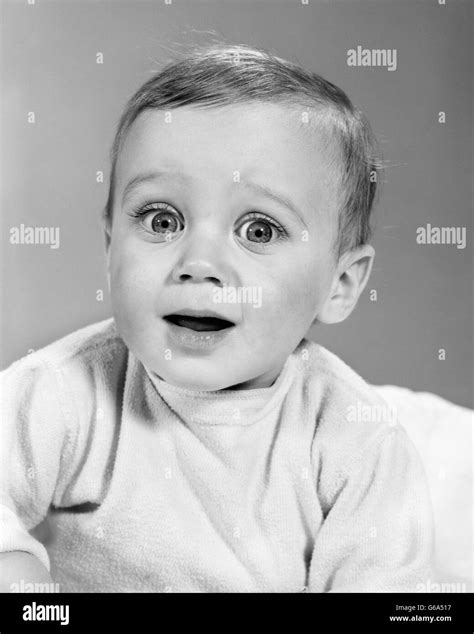 1960s Baby Make Funny Facial Expression With Good Eye Contact Mouth