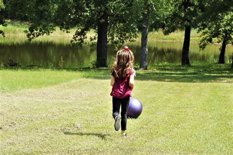 Little Girl Playing With Ball Free Stock Photo Public Domain Pictures