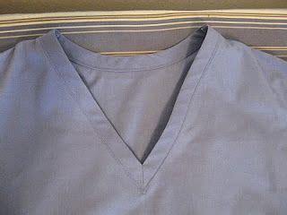 Learn how to clean finish a v neck using bias tape to the inside. How to sew a v-neck binding for scrubs. Tutorial from ...