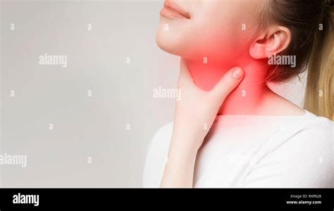 Woman Suffering From Sore Throat Touching Her Neck Stock Photo Alamy