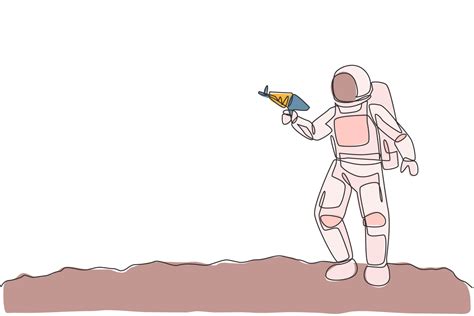 Desenho De Linha Nica Cont Nua De Jovem Astronauta Segurando A Arma Laser Espacial E Posar Para