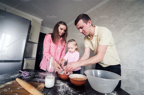 Dad Mom And Daughter Together In The Kitchen High Quality People