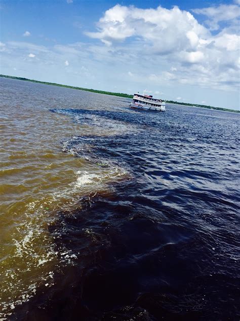 Where The Amazon River Meets Rio Negro Also Known As The Meeting Of