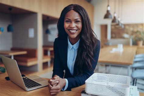 Smiling Young African American Businesswoman Working In An Offic Nkanda