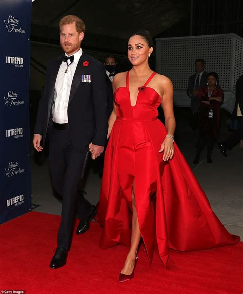Meghan Markle Stuns In Red Carolina Herrera Gown As She And Prince
