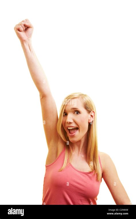 Blonde Woman Celebrates With A Clenched Fist Stock Photo Alamy
