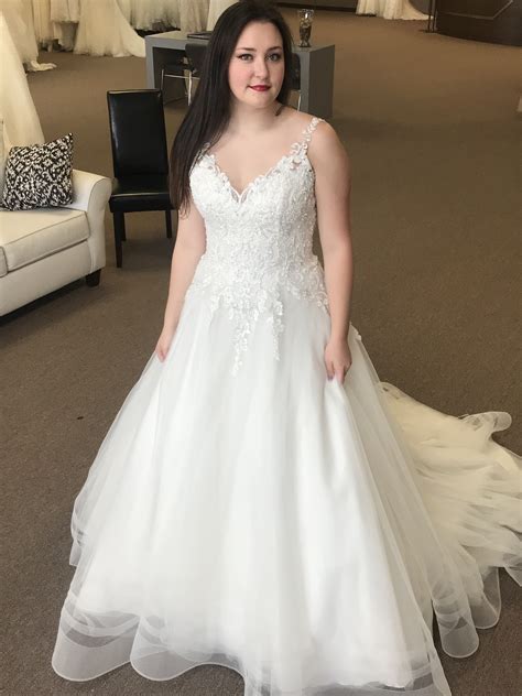 Everyone was commenting on it all night, especially the back! Affordable lace detailed wedding dress names Sylvia by ...